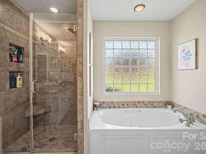 9903 Madres Court, Concord, NC 28027.  MLS# CAR4380486, YatesRealty ID 28544. Primary bath