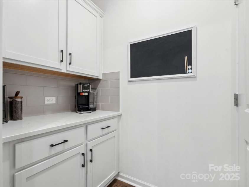 168 Aspire Circle, Wingate, NC 28174.  MLS# CAR4247814, YatesRealty ID 28545. Butler's Pantry