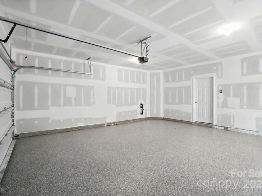 1103 Overland Drive, Dallas, NC 28034.  MLS# CAR4282641, YatesRealty ID 28548. Insulated garage and finished floor. Two windows