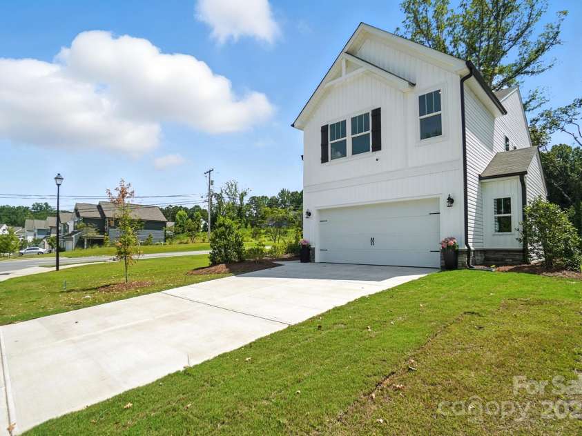 1103 Overland Drive, Dallas, NC 28034.  MLS# CAR4282641, YatesRealty ID 28548. Large corner lot and long driveway