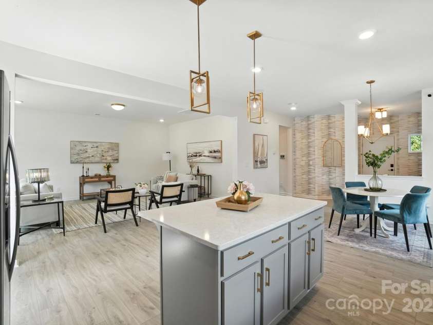 1103 Overland Drive, Dallas, NC 28034.  MLS# CAR4282641, YatesRealty ID 28548. Open kitchen and island with quartz countertops