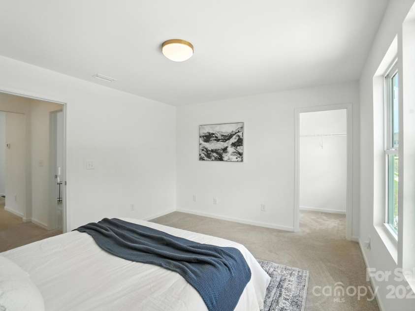 1103 Overland Drive, Dallas, NC 28034.  MLS# CAR4282641, YatesRealty ID 28548. Second bedroom with walkin closet