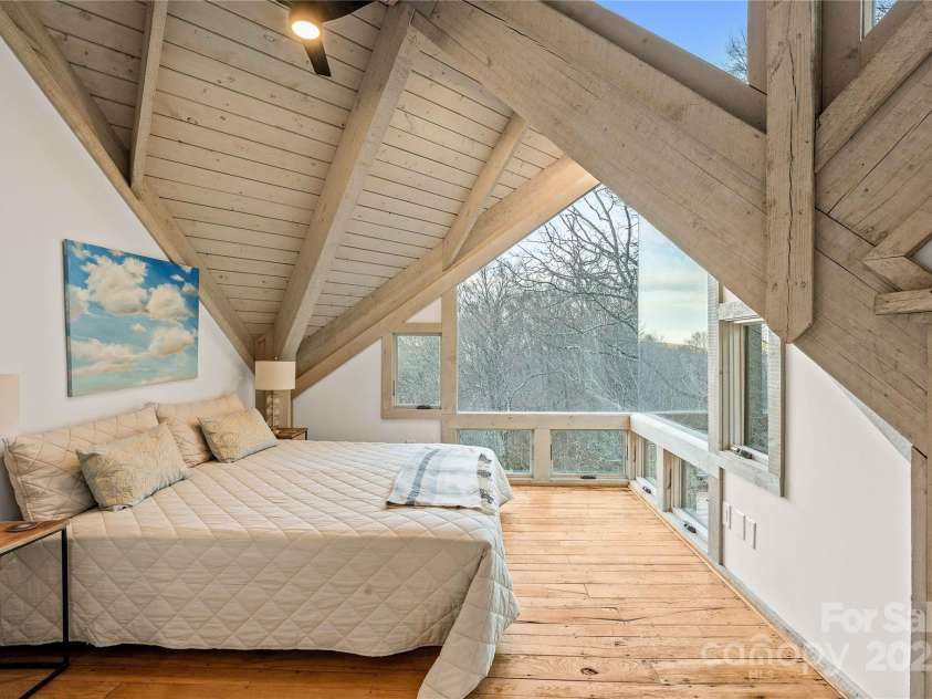 220 Worley Road, Highlands, NC 28741.  MLS# CAR4298610, YatesRealty ID 28552. Spacious and bright primary bedroom