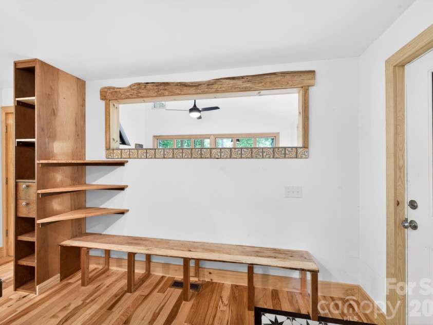 378 Dobson View Drive, Nebo, NC 28761.  MLS# CAR4388812, YatesRealty ID 28557. Entryway with Bench and Shelving