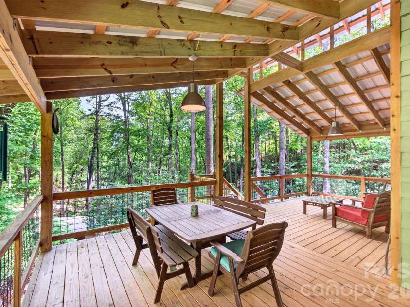 378 Dobson View Drive, Nebo, NC 28761.  MLS# CAR4388812, YatesRealty ID 28557. Fabulous Covered Wrap-Around Deck