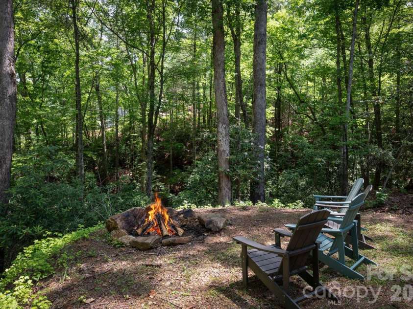 378 Dobson View Drive, Nebo, NC 28761.  MLS# CAR4388812, YatesRealty ID 28557. Firepit Just off the Deck