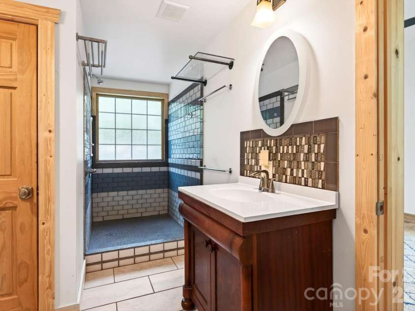 378 Dobson View Drive, Nebo, NC 28761.  MLS# CAR4388812, YatesRealty ID 28557. Primary Bath Includes Walk-In Shower
