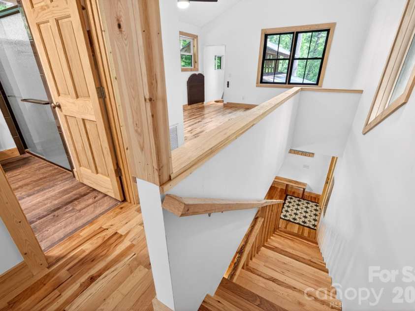 378 Dobson View Drive, Nebo, NC 28761.  MLS# CAR4388812, YatesRealty ID 28557. Upstairs Includes Second Bedroom and Loft Space