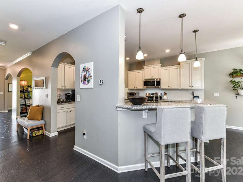 11730 Maher Lane, Huntersville, NC 28078.  MLS# CAR4281709, YatesRealty ID 28558. Archway entries adorn this home!