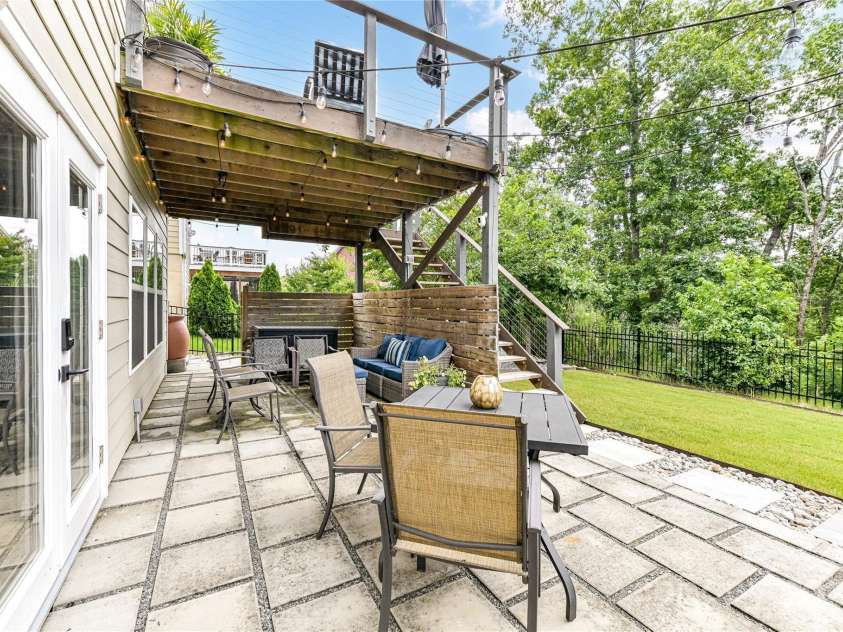 11730 Maher Lane, Huntersville, NC 28078.  MLS# CAR4281709, YatesRealty ID 28558. Expansive Lower level Paver Patio with covered section inside fenced back yard that backs up to woods!