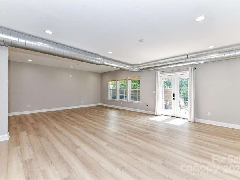 11730 Maher Lane, Huntersville, NC 28078.  MLS# CAR4281709, YatesRealty ID 28558. Finished Walk Out Basement Family Room/Recreation Area!