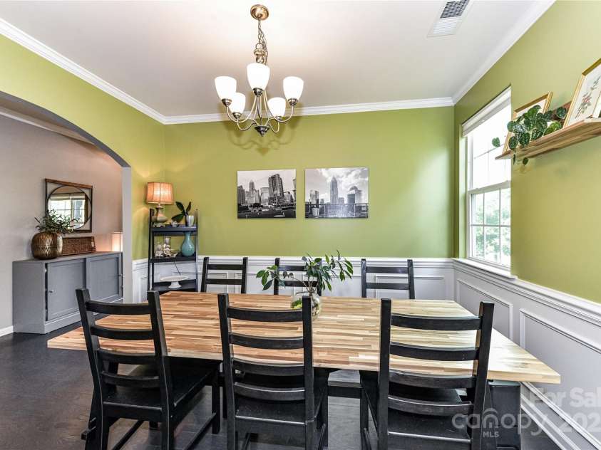 11730 Maher Lane, Huntersville, NC 28078.  MLS# CAR4281709, YatesRealty ID 28558. Formal Dining Room features crown molding & wainsoting with charming archway entry!