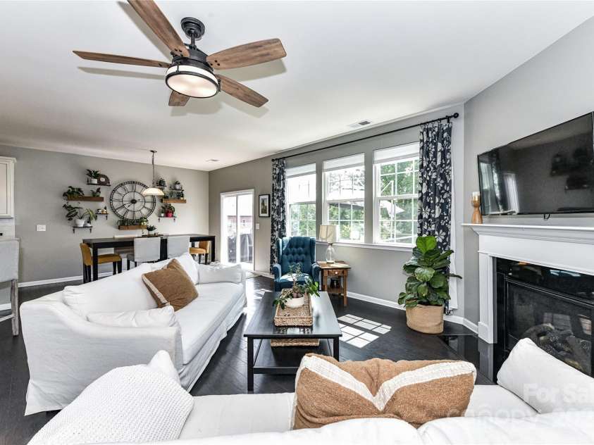 11730 Maher Lane, Huntersville, NC 28078.  MLS# CAR4281709, YatesRealty ID 28558. Great Room offers gas fireplace, ceiling fan/light & deck access!