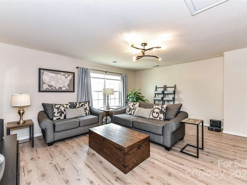 11730 Maher Lane, Huntersville, NC 28078.  MLS# CAR4281709, YatesRealty ID 28558. Large Loft Area perfect for extra seating/living area with LVP & attic storage!