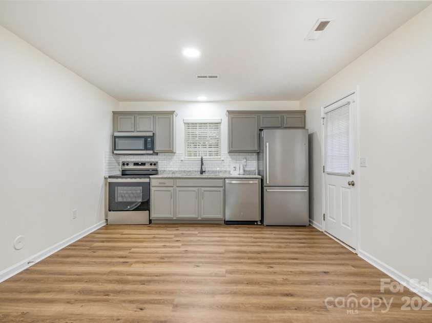 248 Pangle Drive, Charlotte, NC 28217.  MLS# CAR4281610, YatesRealty ID 28559. Kitchen / dining