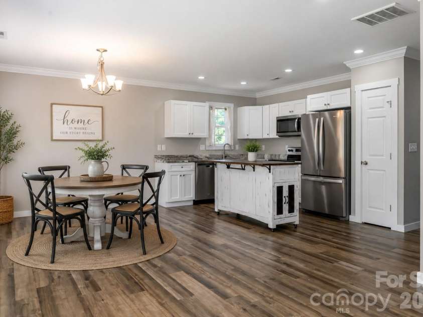 38 Old County Home Road, Asheville, NC 28806.  MLS# CAR4374624, YatesRealty ID 28559. Dining room virtually staged