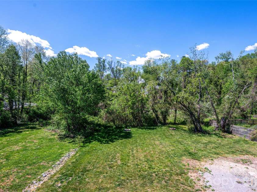 38 Old County Home Road, Asheville, NC 28806.  MLS# CAR4374624, YatesRealty ID 28559. Large flat backyard
