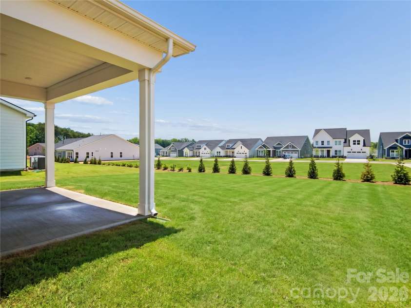 4122 Pinekirk Drive, Charlotte, NC 28269.  MLS# CAR4387957, YatesRealty ID 28562. Covered Patio