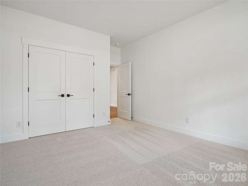 4122 Pinekirk Drive, Charlotte, NC 28269.  MLS# CAR4387957, YatesRealty ID 28562. Main Floor Bedroom