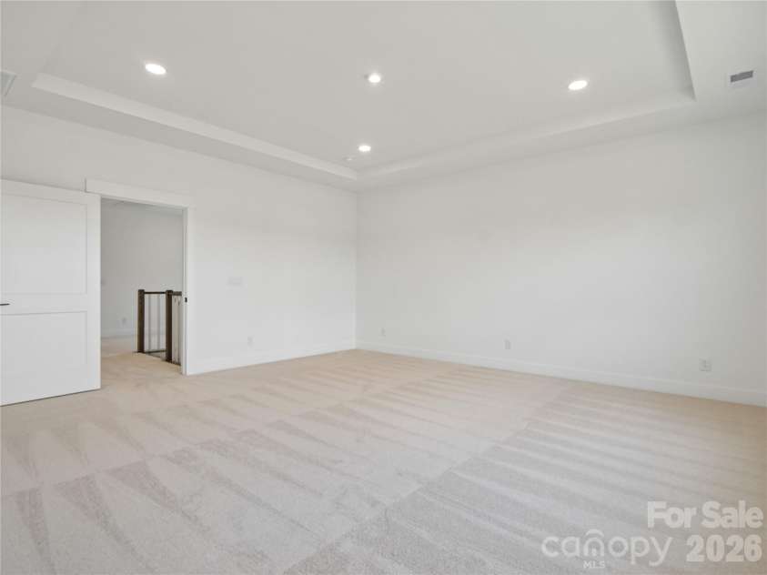 4122 Pinekirk Drive, Charlotte, NC 28269.  MLS# CAR4387957, YatesRealty ID 28562. Primary Bedroom