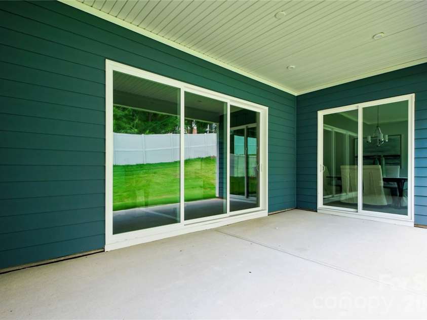 4213 Pinekirk Drive, Charlotte, NC 28269.  MLS# CAR4387916, YatesRealty ID 28563. Covered Rear Patio
