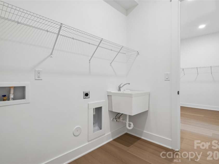 4213 Pinekirk Drive, Charlotte, NC 28269.  MLS# CAR4387916, YatesRealty ID 28563. Laundry Room