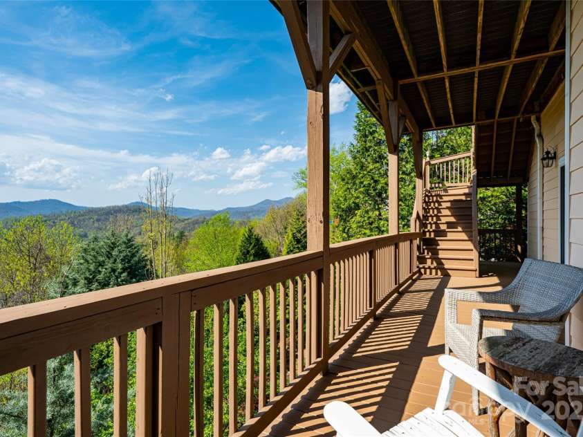 116 Dalya Road, Swannanoa, NC 28778.  MLS# CAR4245409, YatesRealty ID 28569. Lower level deck-basement