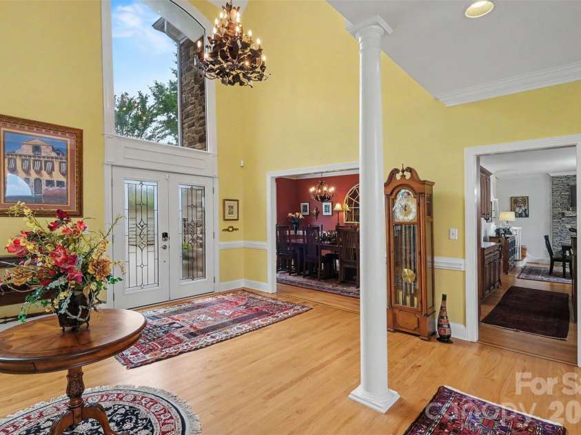 16105 Woolwine Road, Charlotte, NC 28278.  MLS# CAR4385988, YatesRealty ID 28572. Down stairs living room