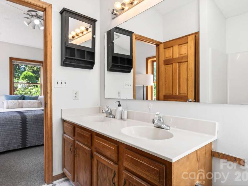 5 Johns Street, Asheville, NC 28806.  MLS# CAR4383037, YatesRealty ID 28573. Primary bathroom