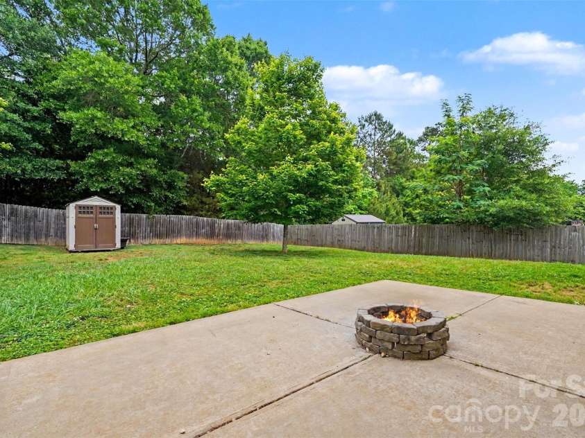 1773 Stuart Carter Avenue, Rock Hill, SC 29730.  MLS# CAR4377063, YatesRealty ID 28576. Backyard Patio