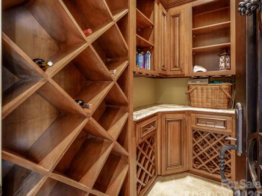 4246 Sigmon Cove Lane, Terrell, NC 28682.  MLS# CAR4338101, YatesRealty ID 2858. Wine Cellar