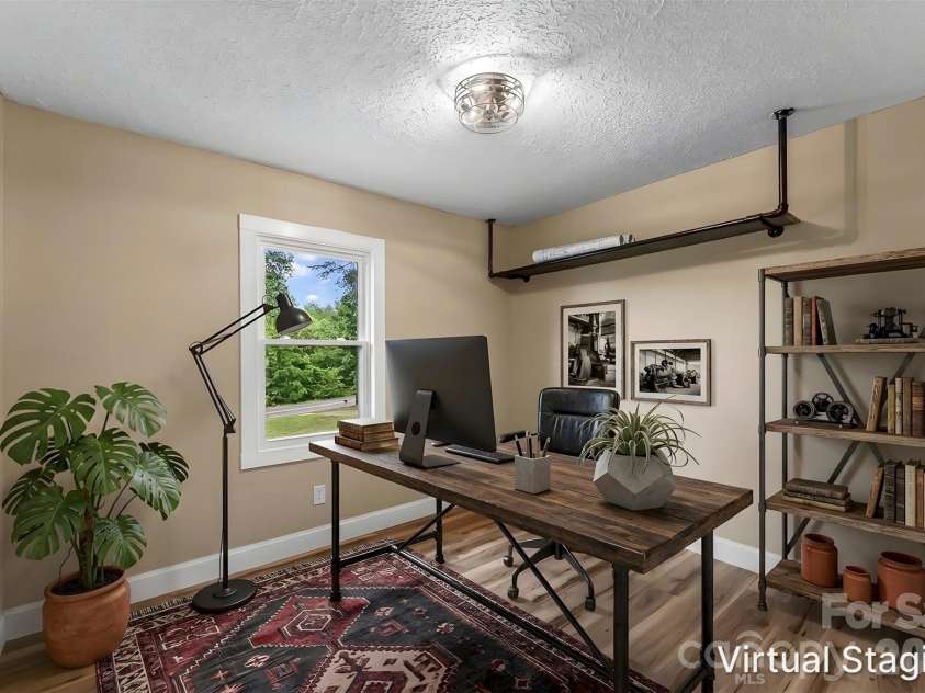 825 Creek Road, Nebo, NC 28761.  MLS# CAR4386618, YatesRealty ID 28582. Virtually staged - 3rd bedroom/laundry/office