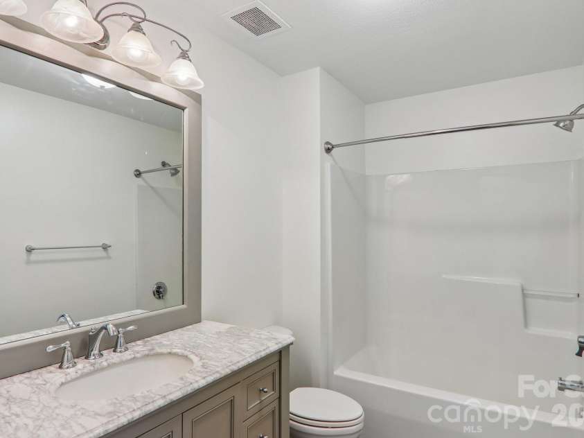 515 Carrington Place, Arden, NC 28704.  MLS# CAR4383772, YatesRealty ID 28586. Second bathroom