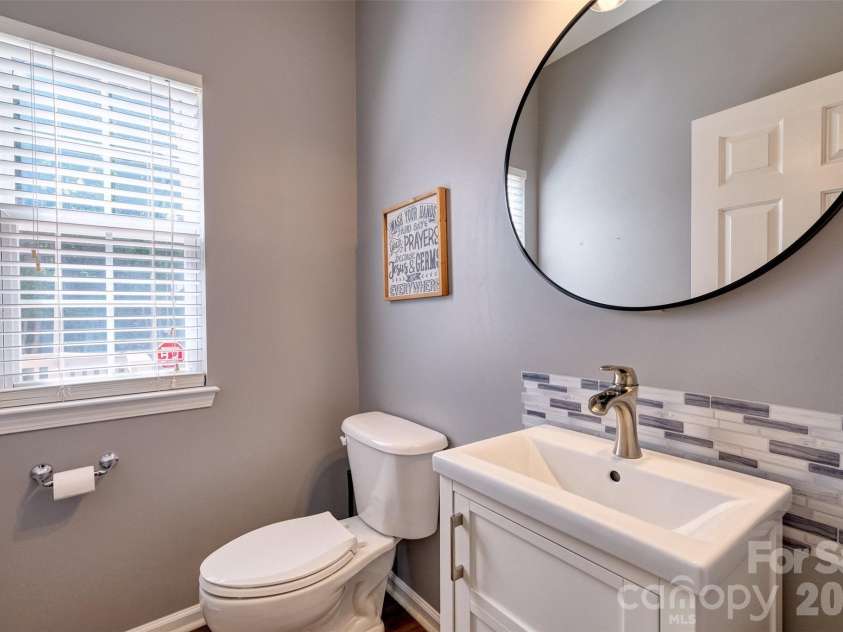 216 Choate Avenue, Fort Mill, SC 29708.  MLS# CAR4380669, YatesRealty ID 28588. Downstairs half bath