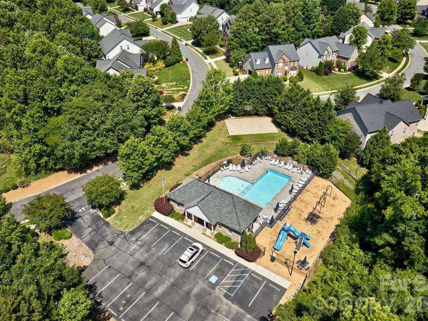 216 Choate Avenue, Fort Mill, SC 29708.  MLS# CAR4380669, YatesRealty ID 28588. Playground beside pool