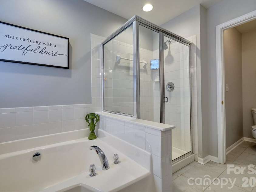 216 Choate Avenue, Fort Mill, SC 29708.  MLS# CAR4380669, YatesRealty ID 28588. Separate shower and jetted tub