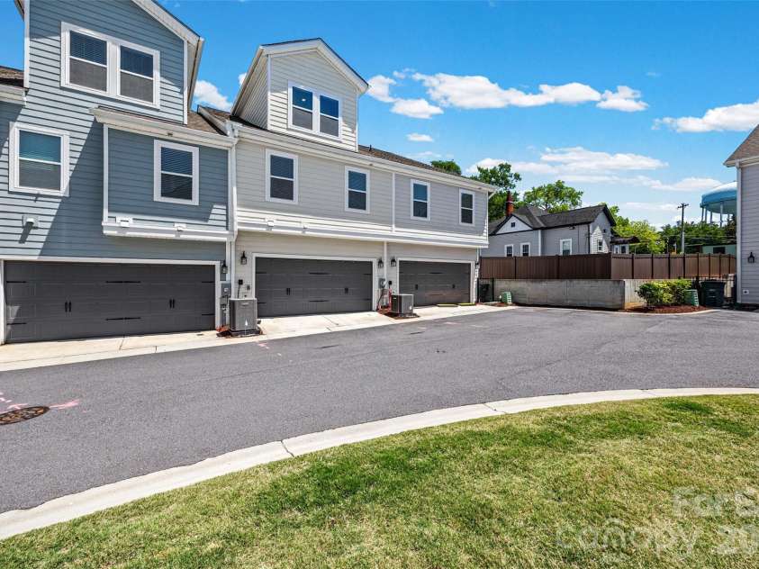 2511 Duncan Avenue, Charlotte, NC 28205.  MLS# CAR4383091, YatesRealty ID 28591. 2 car attached back load garage