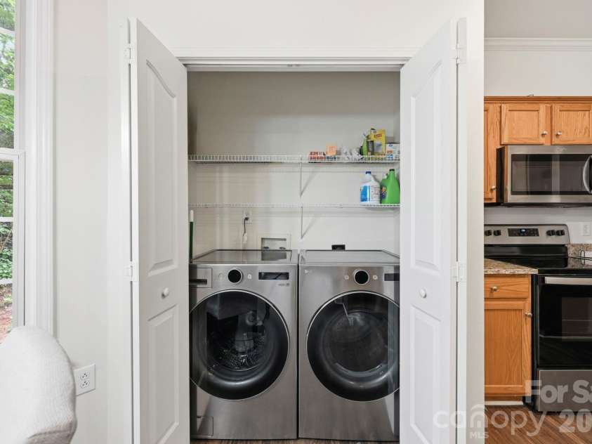 4902 Windchase Lane, Charlotte, NC 28269.  MLS# CAR4389569, YatesRealty ID 28592. Laundry Closet