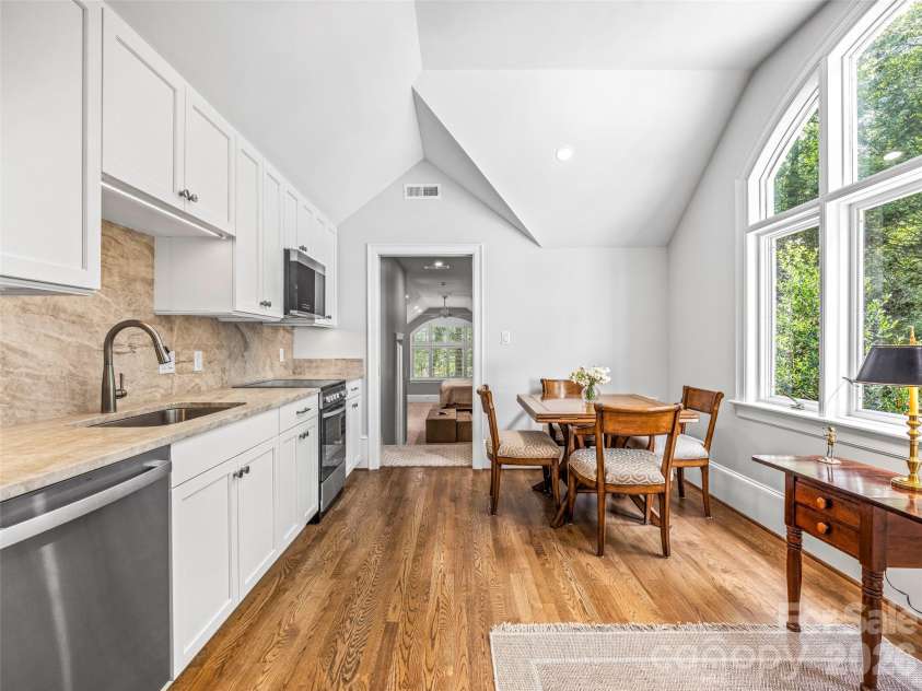 4 Cedar Hill Drive, Asheville, NC 28803.  MLS# CAR4390300, YatesRealty ID 28593. The apartment kitchen and dining area