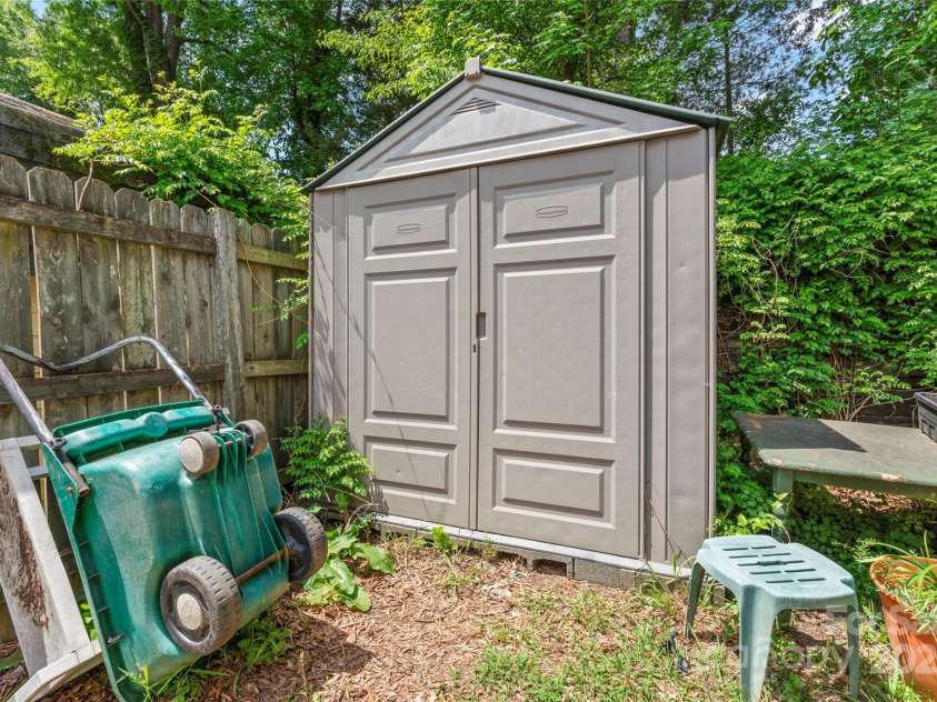 11913 Little Stoney Court, Charlotte, NC 28269.  MLS# CAR4249051, YatesRealty ID 28594. Storage building