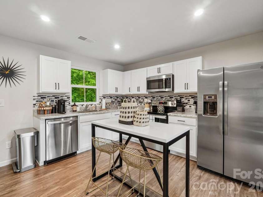 5024 Winding Jordan Lane, Charlotte, NC 28269.  MLS# CAR4385266, YatesRealty ID 28599. Kitchen 2nd floor