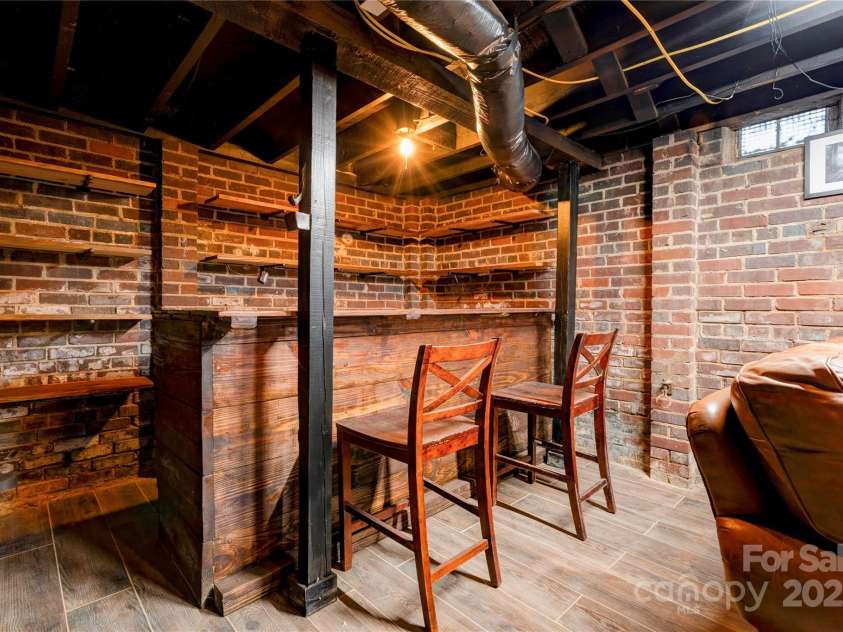 304 Belvedere Avenue, Shelby, NC 28150.  MLS# CAR4310966, YatesRealty ID 286. Basement Entertainment Area with Bar