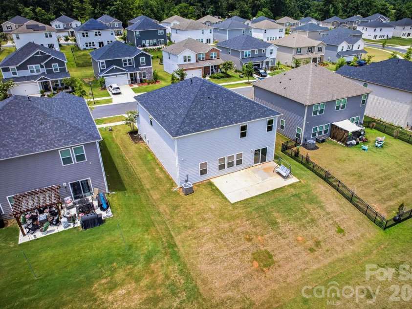 1041 Red Apple Street, Monroe, NC 28110.  MLS# CAR4400677, YatesRealty ID 2860. Backyard