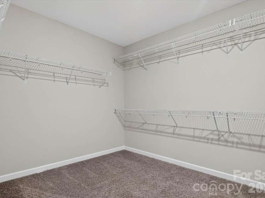 1041 Red Apple Street, Monroe, NC 28110.  MLS# CAR4400677, YatesRealty ID 2860. Master Walk-in Closet