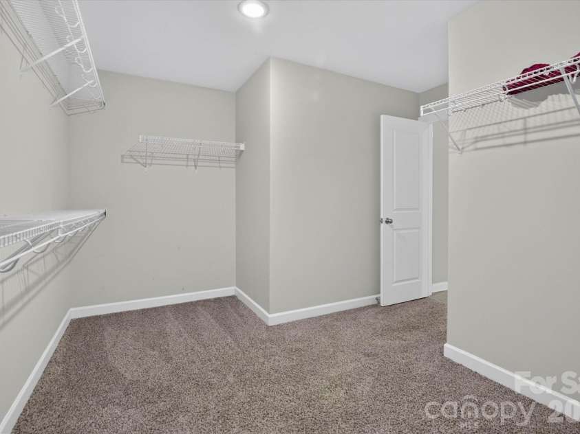 1041 Red Apple Street, Monroe, NC 28110.  MLS# CAR4400677, YatesRealty ID 2860. Master Walk-in Closet