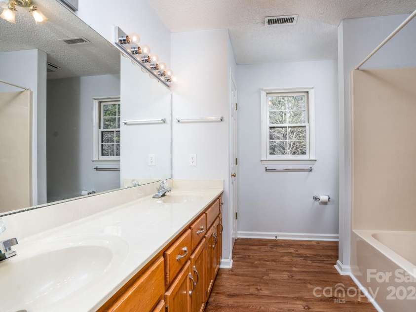 151 Oak Point Drive, Cherryville, NC 28021.  MLS# CAR4135718, YatesRealty ID 2860. Hall Bath at the top of the stairs. The window faces the backyard.