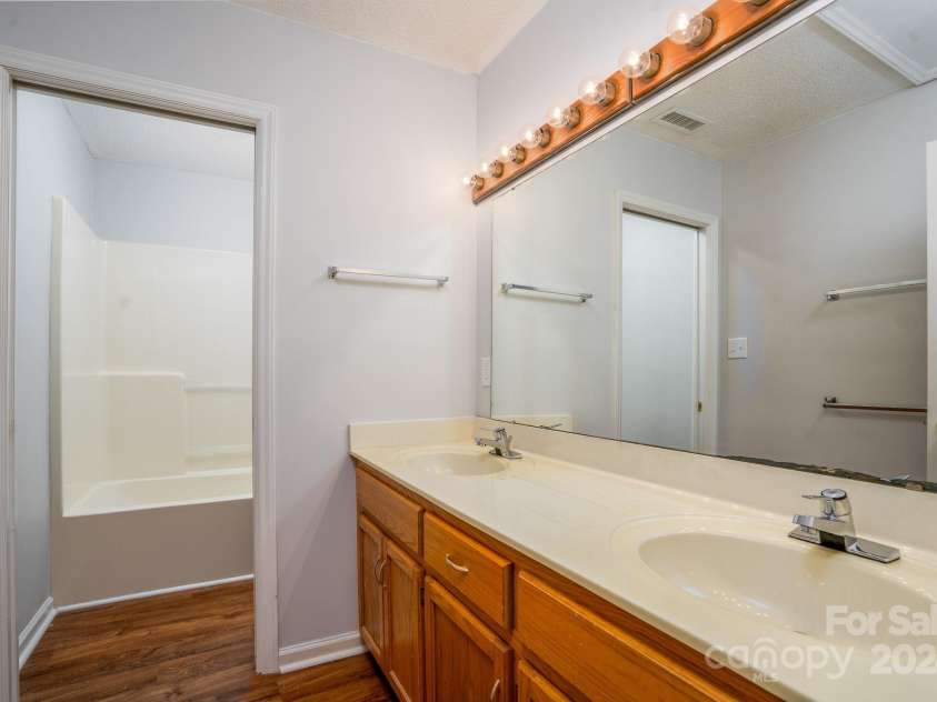 151 Oak Point Drive, Cherryville, NC 28021.  MLS# CAR4135718, YatesRealty ID 2860. Second hall bathroom just outside the door of the upstairs right bedroom.