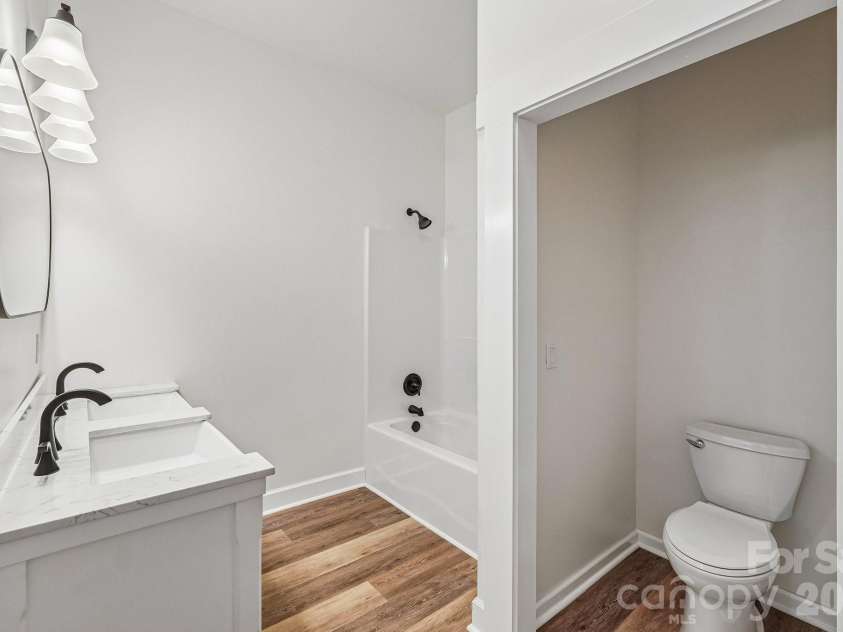 616 14th Street, Hickory, NC 28602.  MLS# CAR4385647, YatesRealty ID 28600. Bathroom and laundry