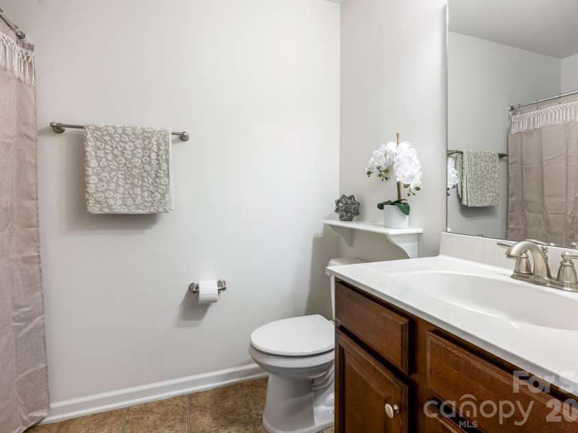 9 Partridge Berry Lane, Weaverville, NC 28787.  MLS# CAR4375602, YatesRealty ID 28605. 3rd full bathroom on upper level.