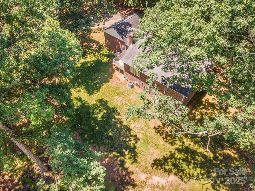 2155 Randolph Road, Shelby, NC 28150.  MLS# CAR4275104, YatesRealty ID 28608. Drone view of back yard